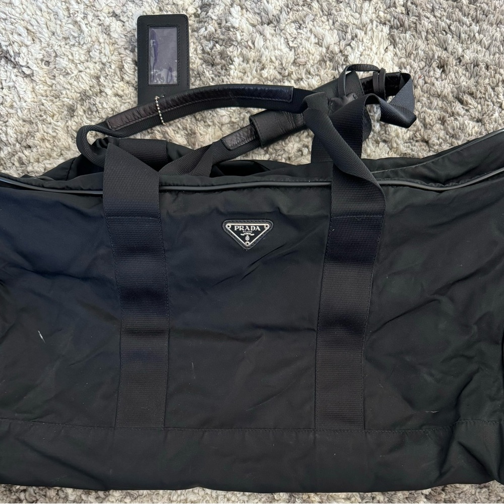 Prada nylon duffle with full zip, loc/keys & luggage tag. EUC